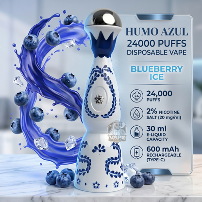 HumoAzul24000PuffsDisposableVapeBlueberryIce, Disposable vape with blue and white design, surrounded by blueberries and ice cubes on a light background.